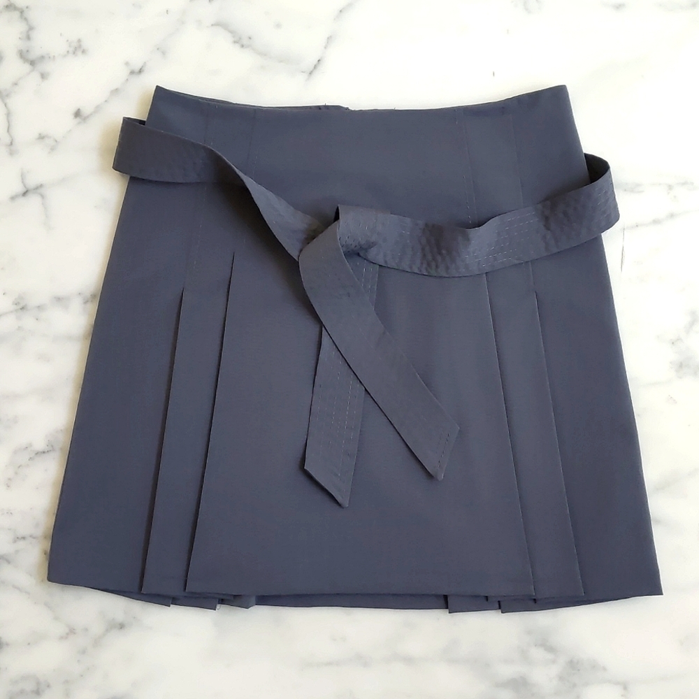 NWOT. The Limited Rayon Spandex Grey Pleated Skirt with full lining and belt.